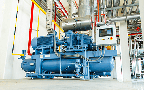 Industrial motor and compressor assembly with control cabinet and instrumentation installed in a technical room