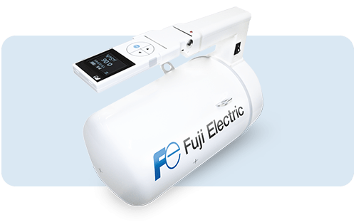 Tragbares Strahlungsmessgerät von Fuji Electric mit Digitalanzeige und integrierter Sonde, das zur Messung ionisierender Strahlung vor Ort verwendet wird.