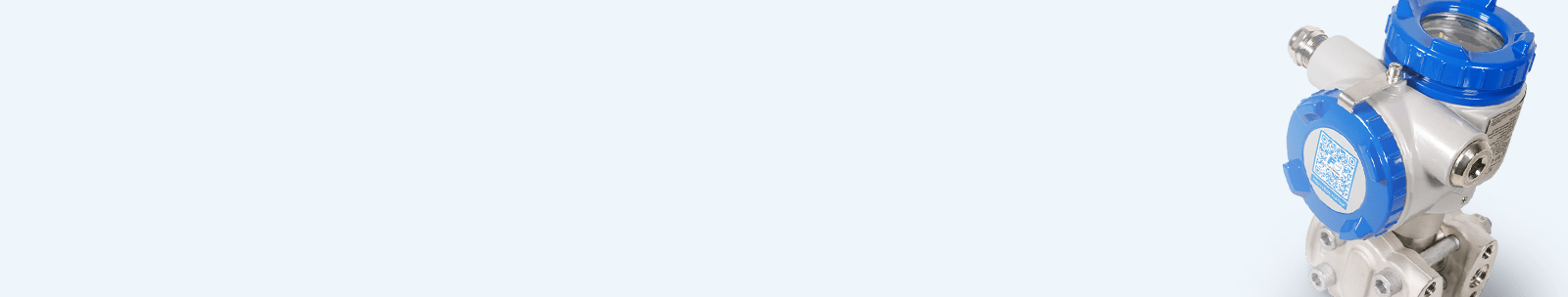 Transmisor de presión industrial con carcasa azul para medir la presión de hidrógeno H2 en instalaciones de proceso.