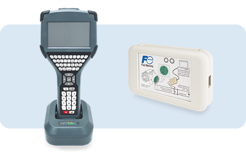 Comunicador HART portátil con pantalla y teclado en la estación de carga, acompañado de un módulo de interfaz de configuración